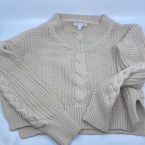 Cropped cable knit sweater